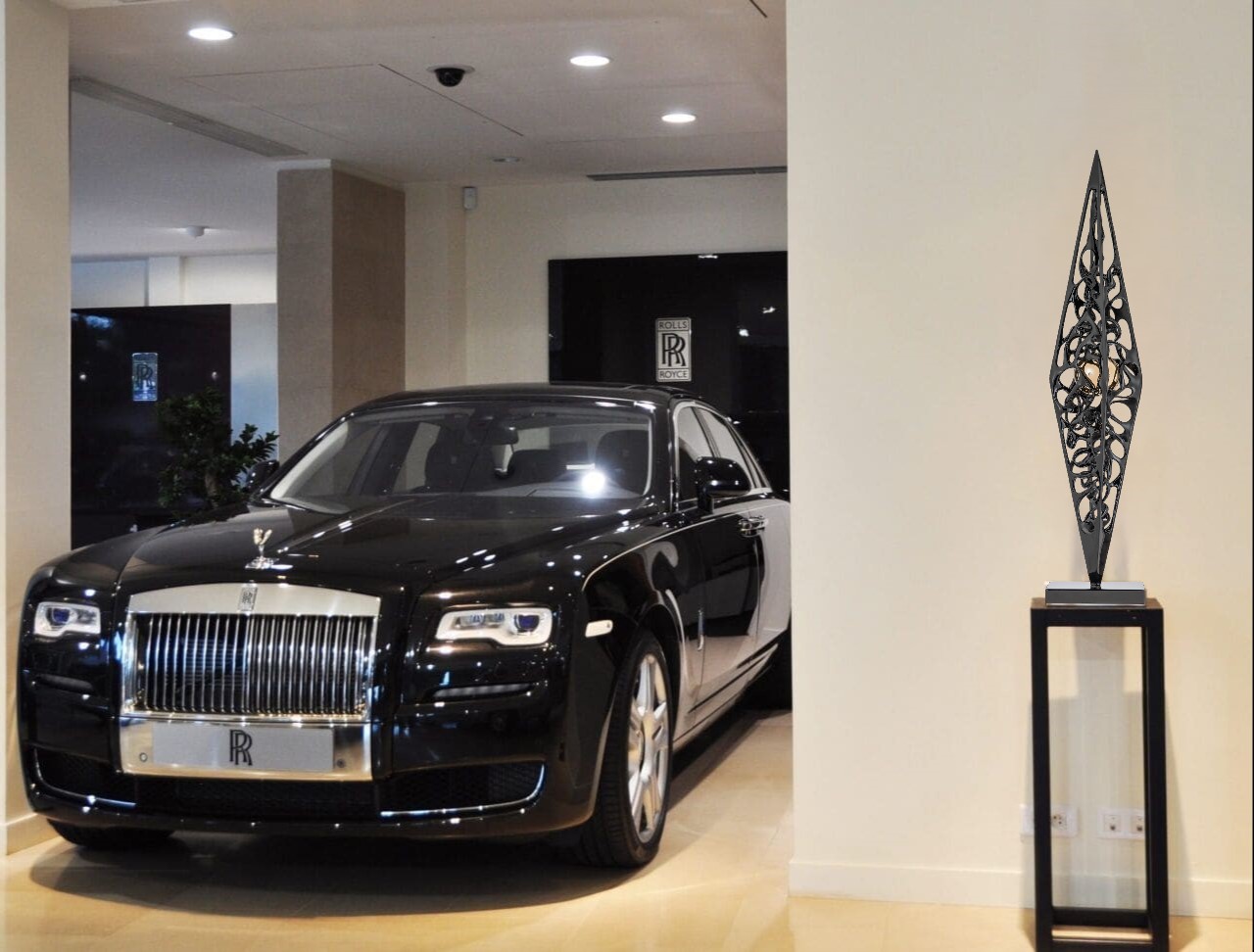 Gianfranco Meggiato Sculptures Contemporary Modern art Doppia Piramide Sculpture in luxury parking with Rolls Royce